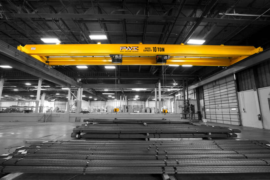 10 ton pwi top running motorized double girder wire rope hoist in manufacturing setting 2