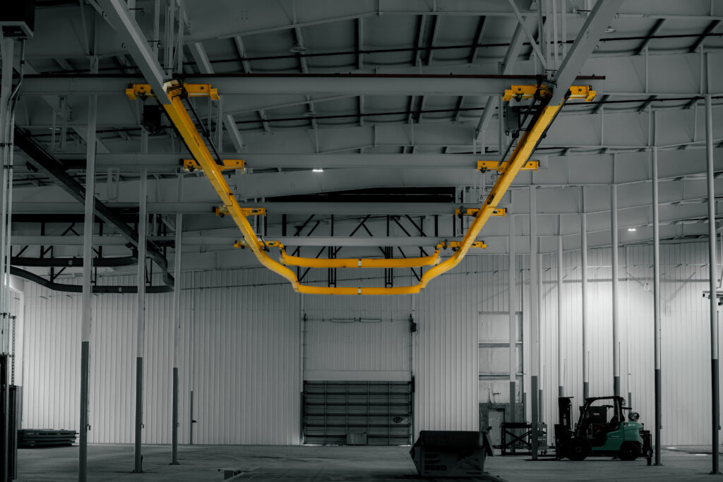 3 ton curved monorail crane in manufacturing setting