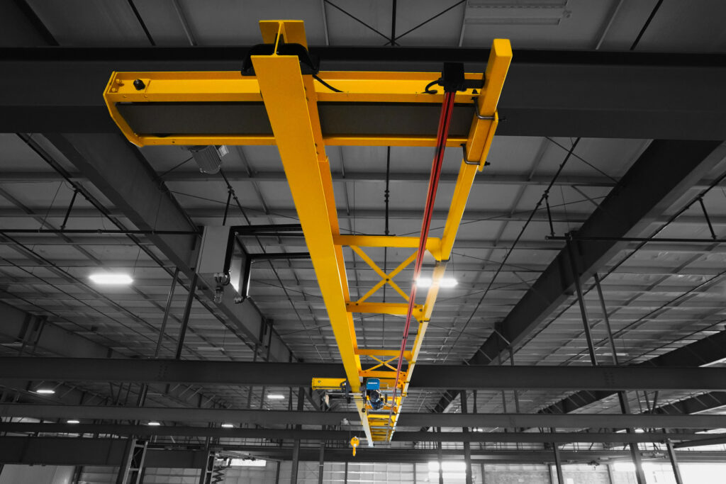3 ton pwi truss design underhung motorized crane shawbox wire rope hoist in manufacturing setting 4