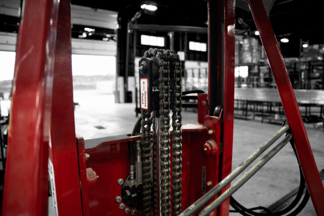 4 thousand pound capacity torque frame rotator chain system in manufacturing setting