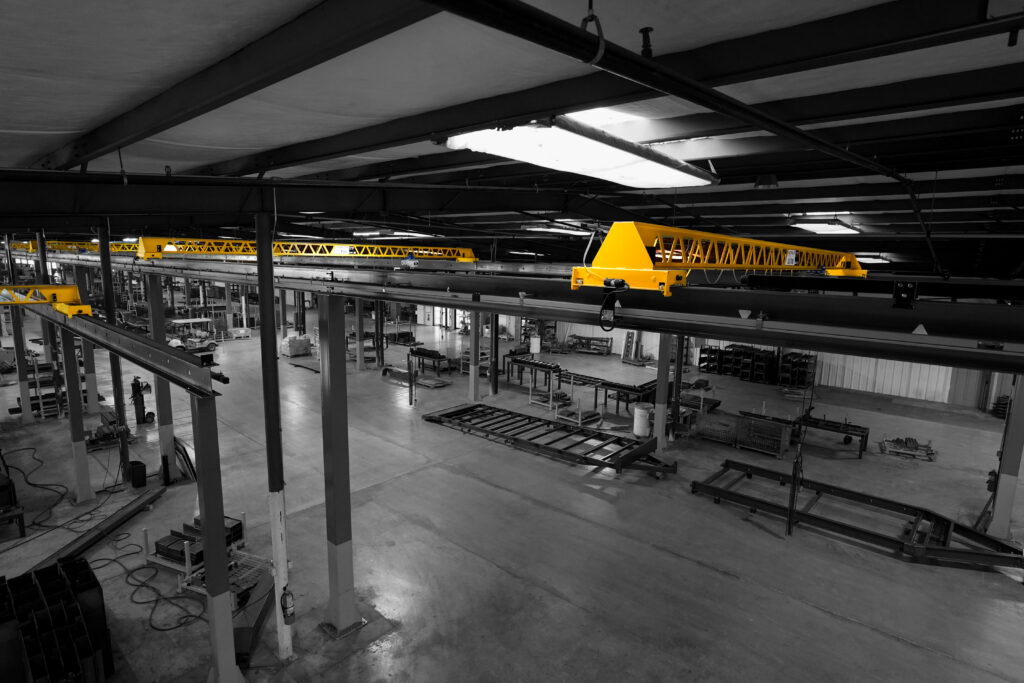 four 1 ton pwi ultralite freestanding crane systems up close end truck