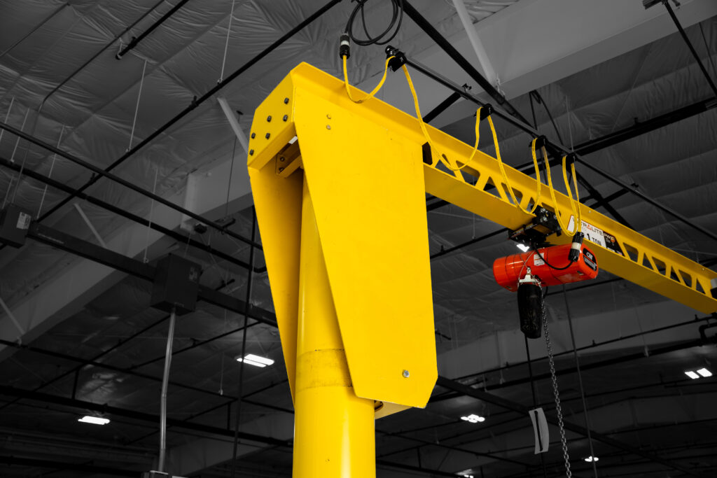 pwi ultralite freestanding jib crane in manufacturing setting 6