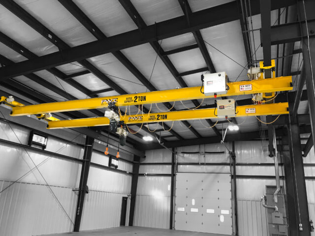 two 2 ton pwi underhung motorized bridge cranes starke hoists in manufacturing setting 2